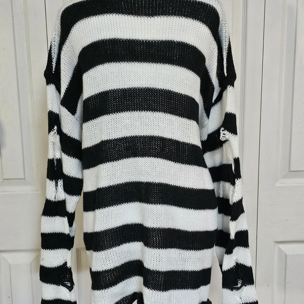 Black & White Striped Oversized Sweater with Cross Detail - Picture 5 of 6